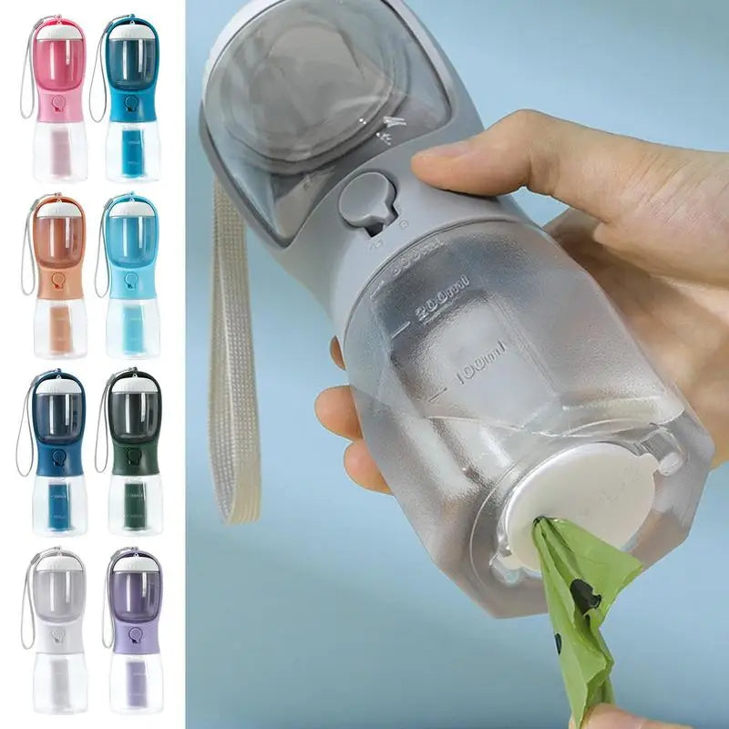 Hand holding the 3-in-1 dog water bottle next to all 9 available colors
